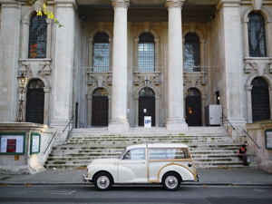 white morris minor traveller goes to london